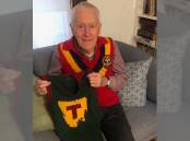 Daryl Hicks and his wife Tricia have handed back a Tasmania state guernsey to the family of Kevin Pelham, who he played against in 1969. Pictures supplied