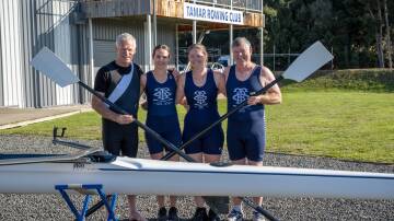 Gerry Steenkamer, 65, and his daughter Bridget Steenkamer, 31, with Alan Howard, 61, and his daughter Carmen Howard, 37, preparing to compete in the Australian Masters Rowing Championships at Lake Barrington. Picture by Paul Scambler
