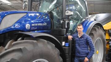 New Holland Australia and New Zealand product segment manager for mixed farming and livestock Ben Mitchell with the new T7.300 tractor at the Future Ag Expo. Picture by Barry Murphy 